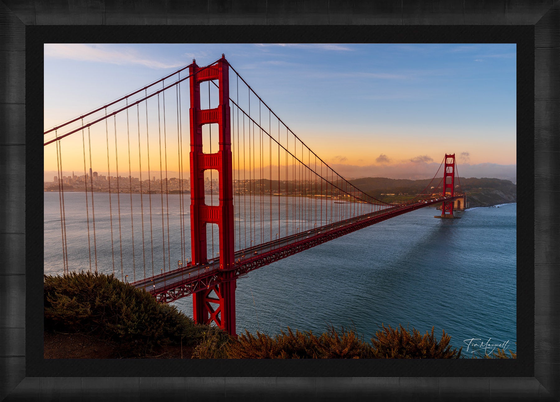 Framed fine art print of the Golden Gate Bridge at sunrise in a ROMA Moulding wood frame with black liner